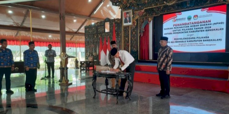 Penandatanganan NPHD Pemilu 2024 di Pendopo Bangkalan/RMOLJatim